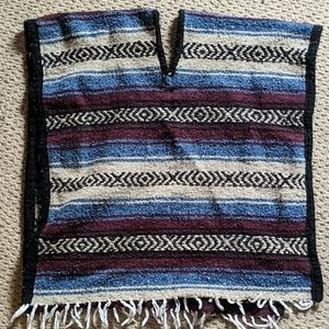 Fringed tribal poncho